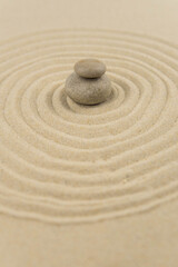 Zen sand garden meditation stone background with copy space. Stones and lines drawing in sand for relaxation. Concept of harmony, balance and meditation, spa, massage, relax. Set Sail Champagne color