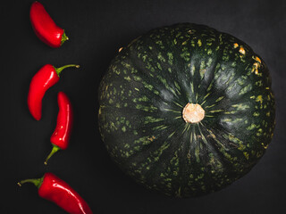 Kabocha squash and red hot peppers.