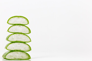 Fresh aloe vera leaves on white background. It is a natural preparation for beauty and skin care and is also used in nutrition.