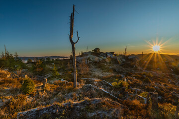Sunrise on Plechy hill in winter sunny cold morning