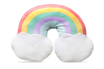 Soft pillow in shape of rainbow on white background