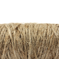 close-up of brown jute rope reel for DIY and gift wrapping, horizontal, white background, sustainable lifestyle