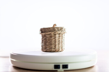 A small wicker basket with a lid to leave things inside.