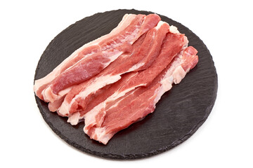 Raw bacon steaks, isolated on white background