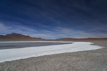 Laguna Blanca, a salt lake in the altiplano of Bolivia at the foot of Licancabur volcano at very high altitude of the andes mountains