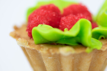 A piece of sweet and tasty cake close-up. Macro shooting. Birthday cake.