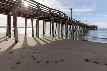 Capitola wharf on the beach at Capitola Village by the Sea. Capitola Village is one of the oldest vacation retreats on Pacific Coast.