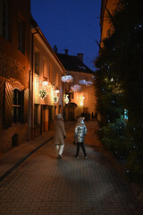 two girls walking in the night