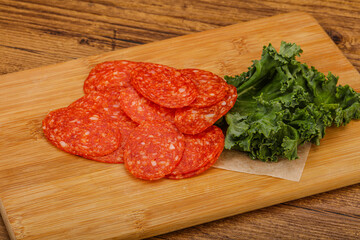 Italian spycy pepperoni sausage slices