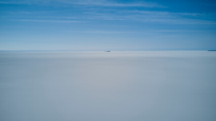 Aerial of Salar de Uyuni, Salar de Tunupa, worlds largest salt flat, in the altiplano of Bolivia in the andes mountains. Worlds biggest lithium source and popular travel destination in South America