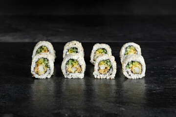 Sushi Rolls. Sushi Rolls Set, maki, philadelphia and california rolls, on a Black background.