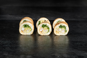Sushi Rolls. Sushi Rolls Set, maki, philadelphia and california rolls, on a Black background.