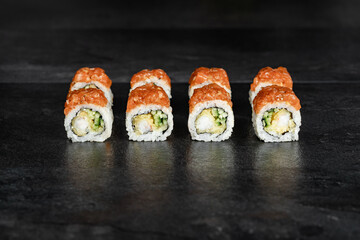 Sushi Rolls. Sushi Rolls Set, maki, philadelphia and california rolls, on a Black background.