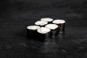 Sushi Rolls. Sushi Rolls Set, maki, philadelphia and california rolls, on a Black background.