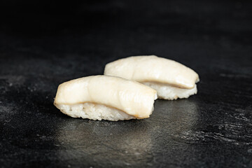 Sushi Rolls. Sushi Rolls Set, maki, philadelphia and california rolls, on a Black background.