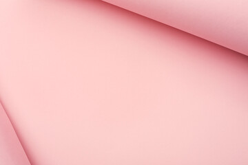 Pastel pink curved paper abstract background with copy space.