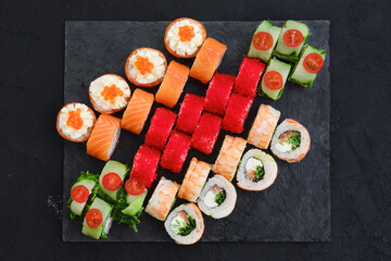 Big set of rolls with shrimp, salmon, eel, tuna and flying fish roe
