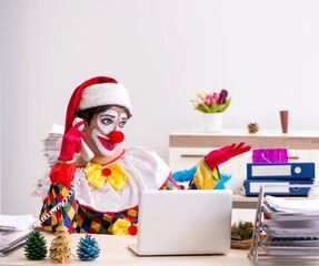 Funny clown in Christmas celebration concept