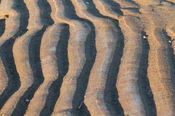 Sand texture with the last lights of the day