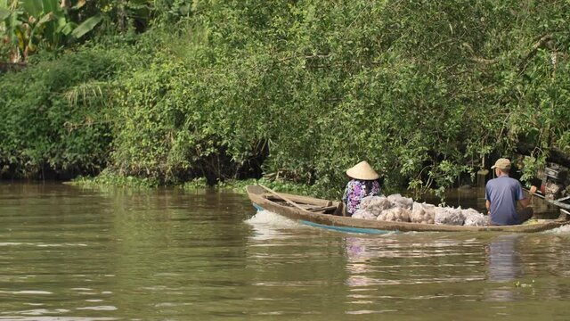 Mekong Delta in Vietnam. View from the boat. Cai Be floating market on the south of Vietnam.