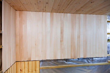 Wooden walls of a traditional sauna. Construction in progress