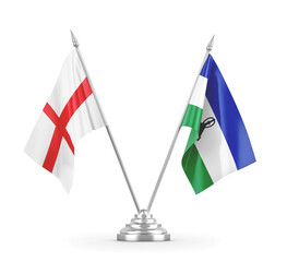 Lesotho and England table flags isolated on white 3D rendering