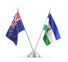 Lesotho and New Zealand table flags isolated on white 3D rendering