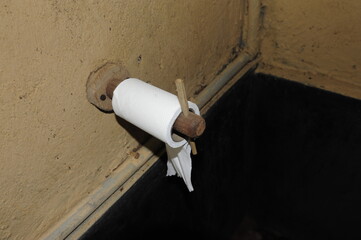 toilet paper in a restroom