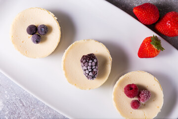 Cheesecake with delicious berries on a plate