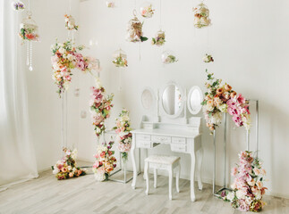 festively decorated studio elements boudoir table decorated with flowers
