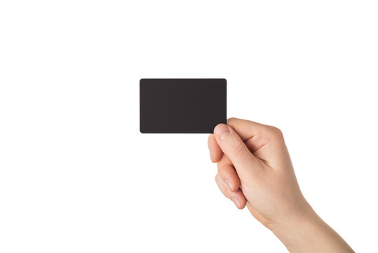 Cropped close up photo image of female hand giving you blank black credit card isolated white color background