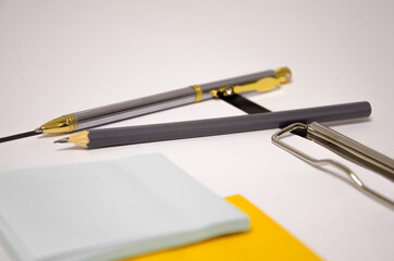 pen stickers office tablet lies on white background