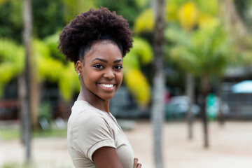 Pretty caribbean woman with afro hair - obrazy, fototapety, plakaty