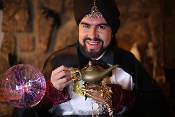 Amazing man holding genie lamp