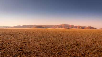 Beautiful and colorful mountains of Namibia at sunset.