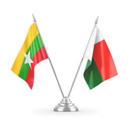 Madagascar and Myanmar table flags isolated on white 3D rendering