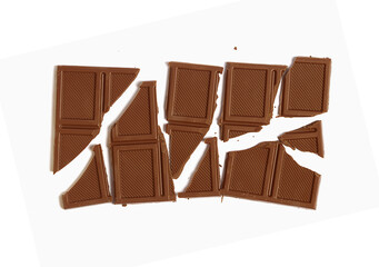 broken milk chocolate on a white background