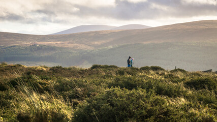Fototapeta premium Couple walking in the Dublin Mountains