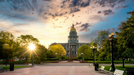 Denver State Capital building with dramatic sunrise