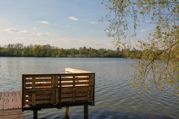 wooden pier on the lake - 400620268