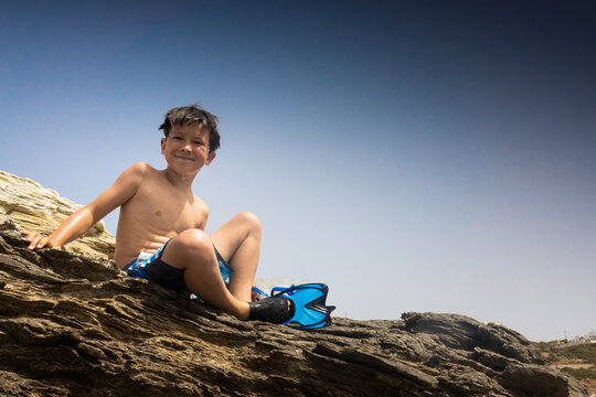 Portrait Of Boy With Diving Flippers