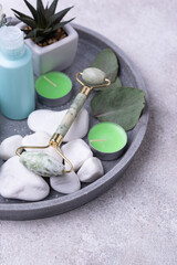 Green jade facial roller for skincare
