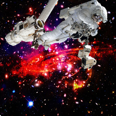 Obraz na płótnie Canvas Astronaut surfing dark space. Planets stars. Space scene. The elements of this image furnished by NASA.