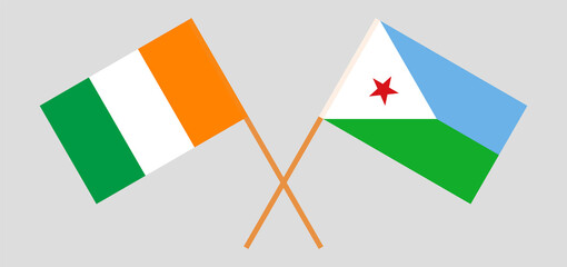Crossed flags of Republic of Ivory Coast and Djibouti