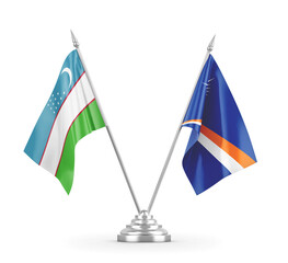 Marshall Islands and Uzbekistan table flags isolated on white 3D rendering