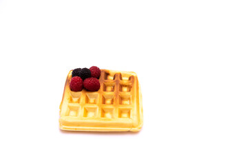 Belgian waffles with red and black raspberries
