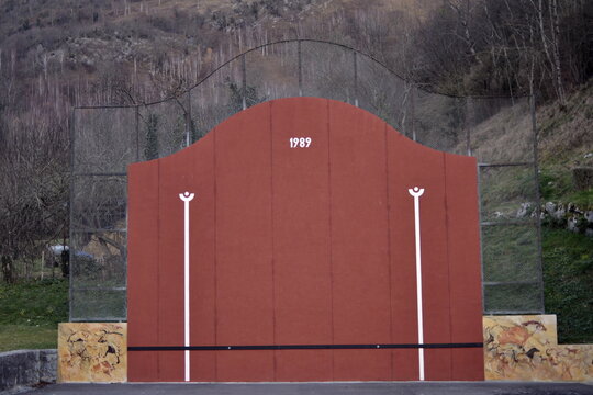 A Basque pelota wall stands in a village in the south of France.