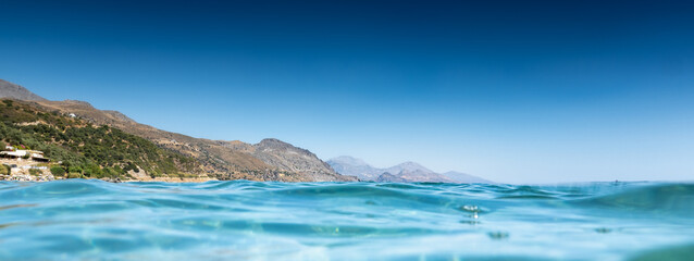 Blue sea with mountains