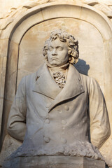 Stone figure of musical genius, composer and pianist Ludwig van Beethoven, in a monument from 1898