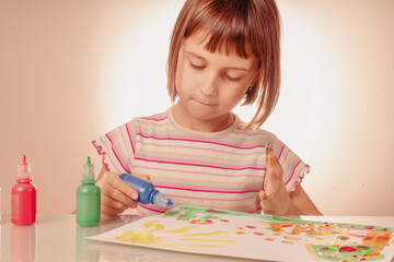 Art and fun leisure time concept. Beautiful young girl great artist painting picture with hands. Horizontal image.